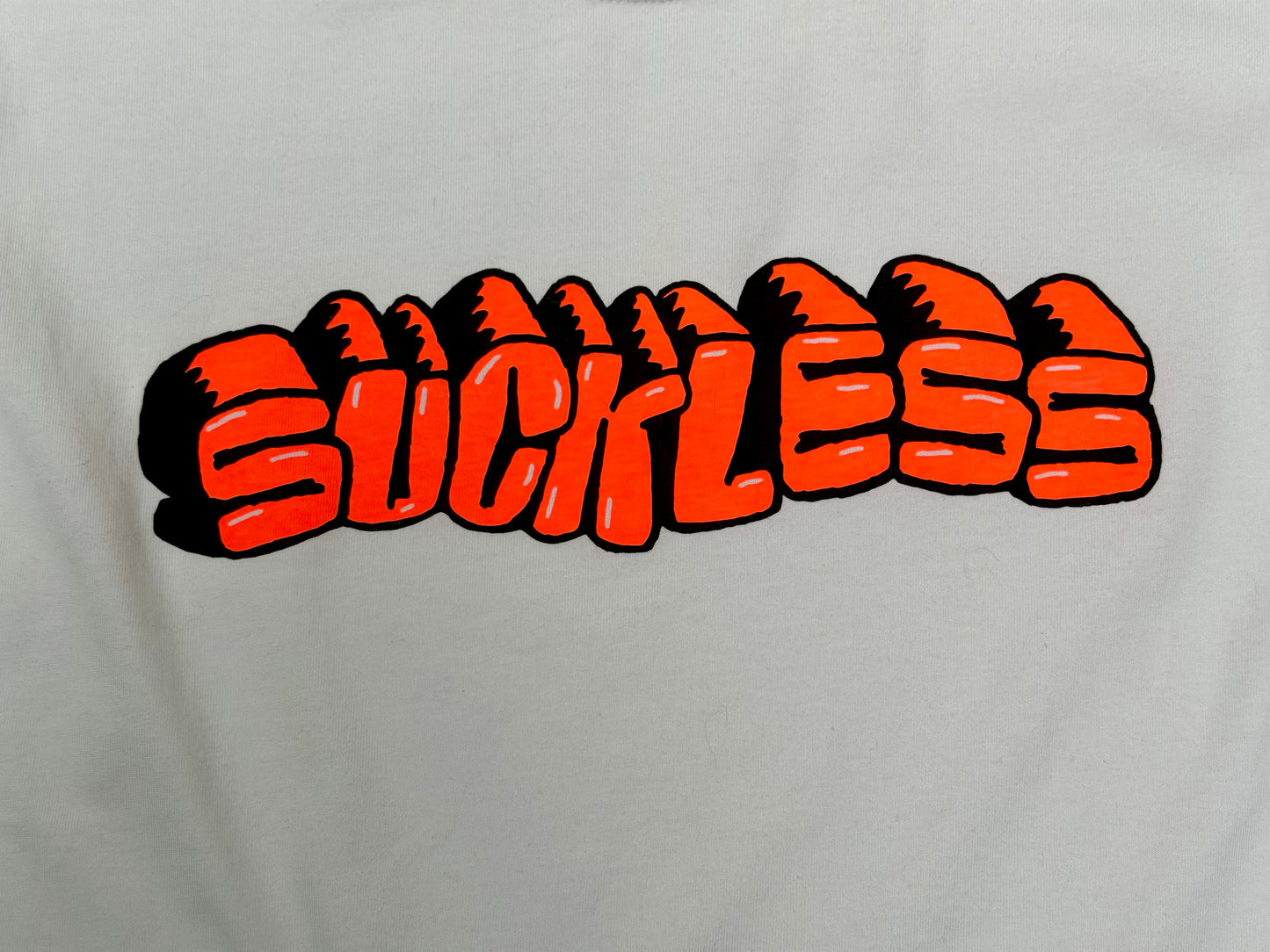 SUCKLESS tee